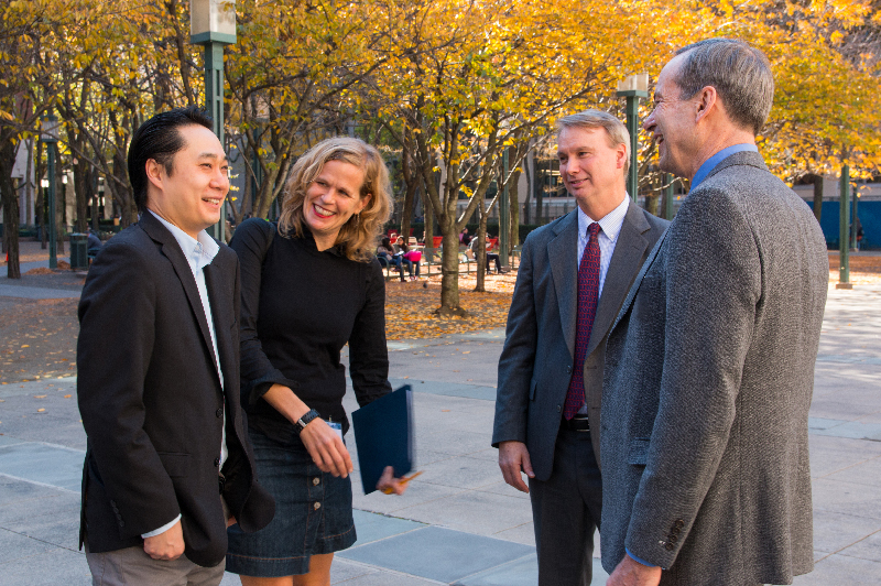 Group of professionals talking outside